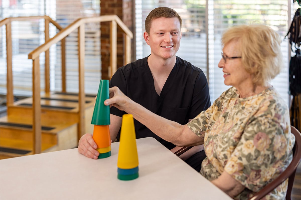 Occupational therapist working with patient at Lewis Park Post Acute